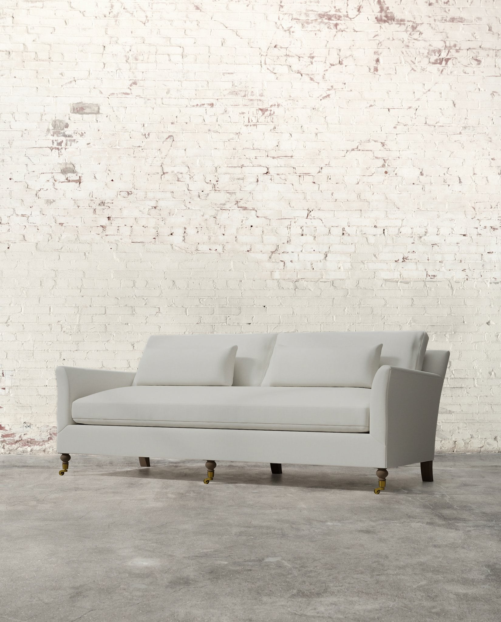 Alfie 87" Bench Sofa with Brass Casters