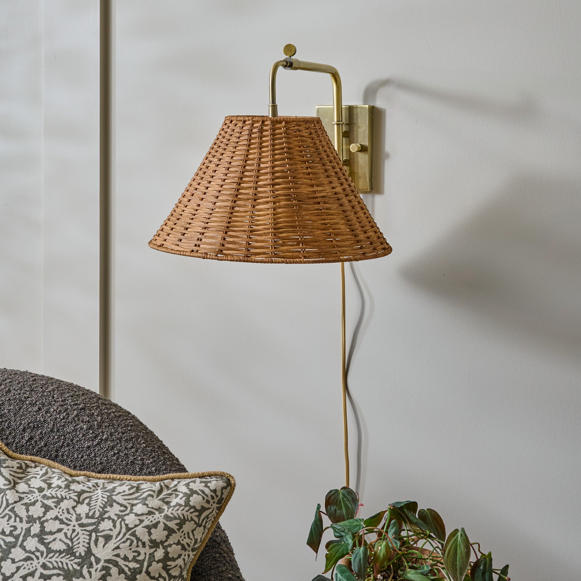 Tapered Rattan Swivel Plug-In Sconce